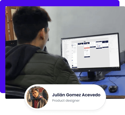 Julián working at his desk
